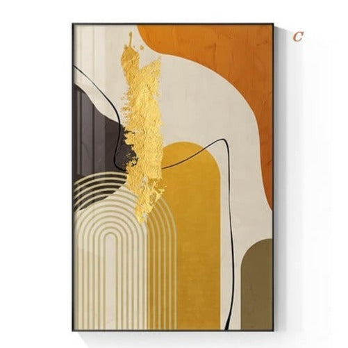 Two framed abstract geometric canvas prints with beige, gold, and multicolor elements displayed above a modern sofa in a living room setting.