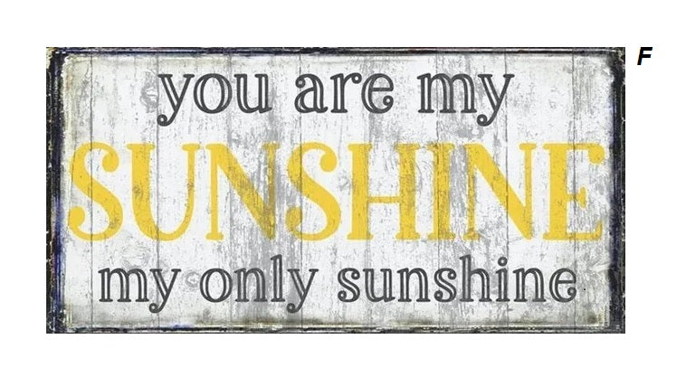 Rustic sign with distressed wood background and text: "you are my SUNSHINE my only sunshine." The word "SUNSHINE" is highlighted in yellow.