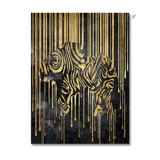 Two canvas prints featuring abstract animal designs, with gold and black colors, displayed on a wall in a dining room setting.