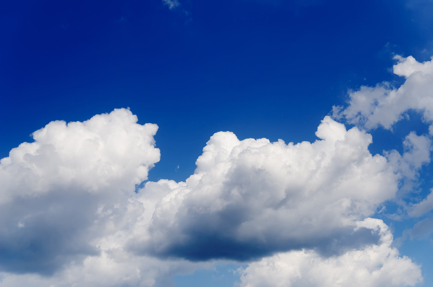 Happy Clouds Blue Mural Wallpaper (SqM)